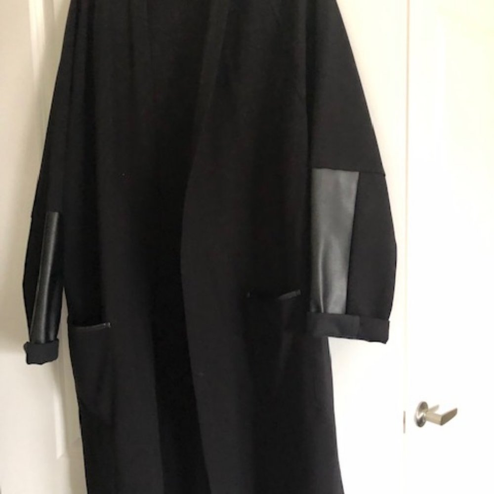 Joseph Ribkoff light coat size 18 long ,with leather on sleves